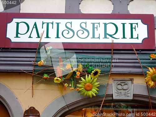 Image of Outdoor sign of a french cake shop - France