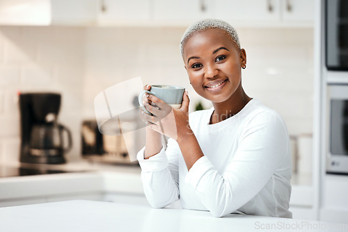 Image of Black woman in kitchen, coffee and portrait, relax at home and morning routine with warm caffeine beverage. Female person holding mug, smile and happy in apartment with espresso and positivity