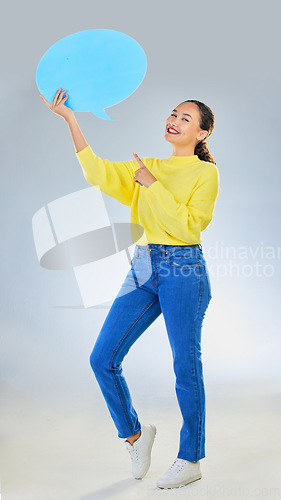 Image of Speech bubble, woman pointing and student presentation, chat or communication for college opportunity or forum. Portrait, information and person for university FAQ or quote on studio white background