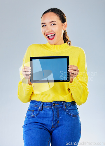 Image of Tablet screen, space and woman or student for university presentation, discount news or e learning information. Portrait of person, digital mockup and college or education wow on studio background