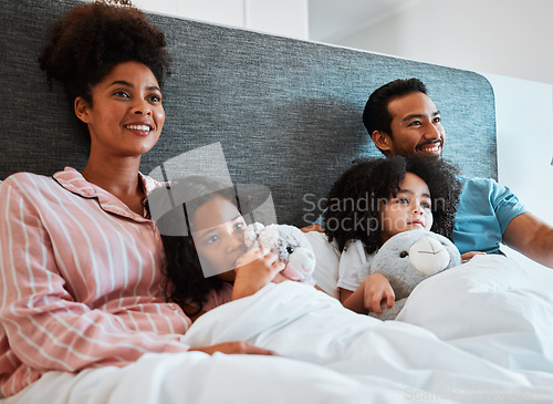 Image of Bed, home and relax happy family watching tv show, subscription movie or streaming entertainment film. Bonding, morning love or bedroom people watch television, media or cartoon video in apartment