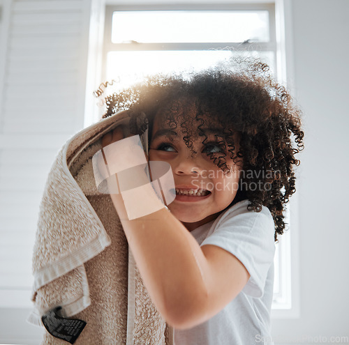 Image of Bathroom, towel or child washing hair in shower in daily morning grooming routine at home. Biracial kid, natural or young boy cleaning for wellness, hydration or healthy haircare with afro hairstyle