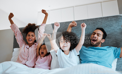Image of Bed, celebration and excited happy family watching tv show, children movie or bonding cheers for film. Home fans, morning kids and bedroom people scream for sports team, television or celebrate video