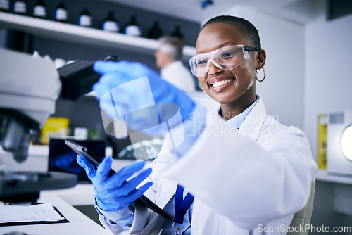 Image of Black woman, test tube or happy scientist with tablet for pharmaceutical research, innovation or medicine. Medical data, smile or African biologist in science analysis in laboratory studying a cure