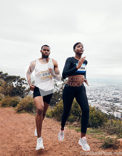 Image of Run, couple and mountain with fitness workout and training on a race and marathon. Runner, young people and road on a exercise challenge outdoor with sport cardio performance in nature together