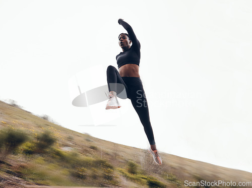 Image of Fitness, running and fast with black woman in nature for health, workout and challenge. Performance, sports and exercise with female runner training in outdoor for speed, marathon and wellness