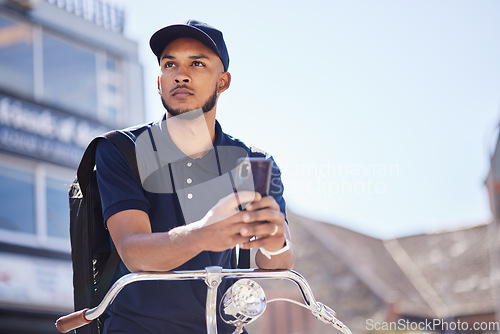 Image of City man, cellphone or thinking about travel journey, bicycle route or sustainable transport on morning commute. Carbon neutral bike, gps smartphone app or planning male student looking at direction