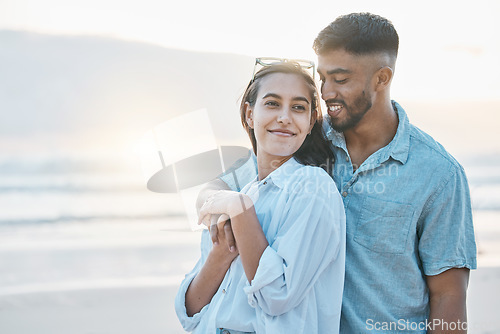 Image of Couple, hug on beach and love, travel and holiday with mockup space and happiness together outdoor. Summer, support and care with affection, man and woman in nature with adventure by the ocean