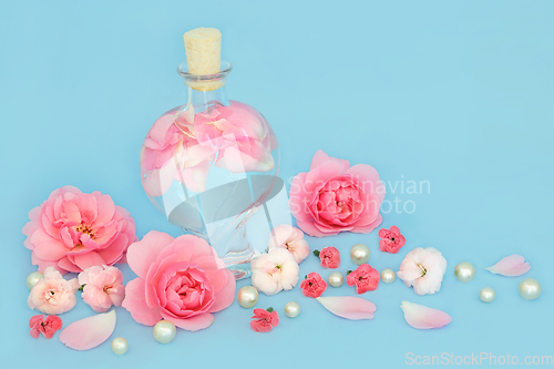 Image of Rosewater for Skincare with Rose and Carnation Flowers