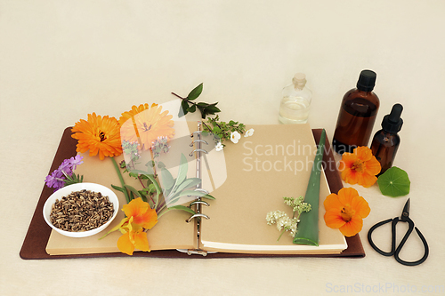 Image of Natural Homeopathic Herbal Medicine with Flowers and Herbs