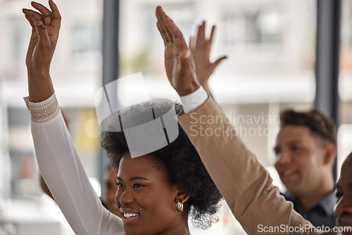 Image of Happy business people, black woman or hands up in seminar for participation or learning skills. Vote, smile or audience asking questions in group mentorship, training or coaching in workshop together