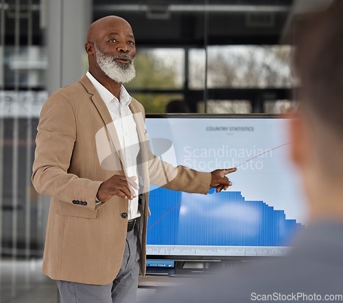 Image of Mentorship, black man teaching or business people in presentation for data report or financial analysis. Pointing, leader or senior manager in meeting with graphs stats on screen monitor in training