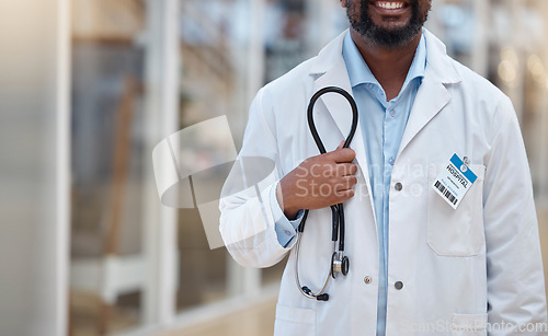 Image of Hospital, doctor and hands of black man with stethoscope for cardiology, consulting and medical service. Healthcare, clinic and closeup of male health worker with equipment for support, exam and help
