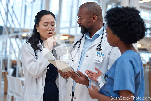 Image of Doctors, mistake and healthcare team fail and scared with paperwork or planning in a hospital and talking with fear. Document, diversity and bad professional group in discussion or conversation