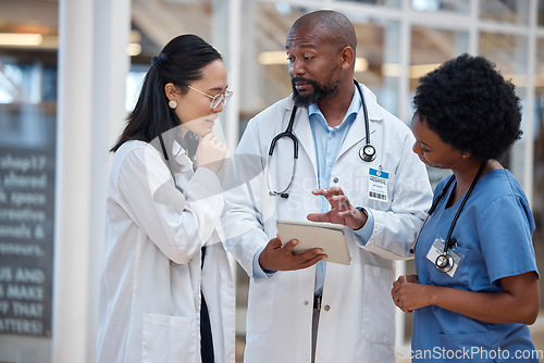 Image of Medical, team and doctor planning research in a hospital and talking about results as teamwork communication. Discussion, healthcare and professional group speaking about medicine strategy in clinic