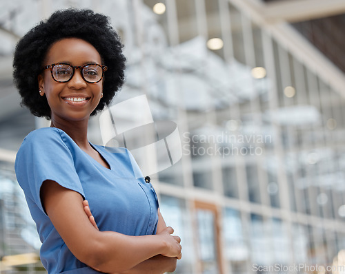 Image of Nurse, arms crossed and portrait of black woman in hospital for medical, support and expert. Medicine, healthcare and nursing with female person in clinic for wellness, life insurance and surgery