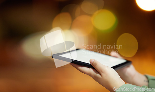 Image of Woman, hands and tablet with mockup screen at night in city for communication, networking or browsing. Hand of female person or freelancer working late with technology display in an urban town