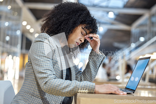 Image of Stress, headache and woman with laptop in office, debt crisis and mental health burnout problem. Frustrated, overworked and tired African employee with tax fear, anxiety and deadline time pressure.