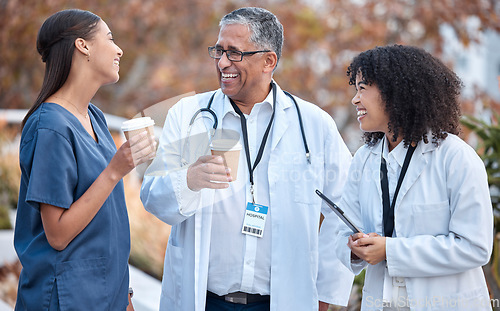 Image of Coffee break, talking and doctors for healthcare planning, happy conversation and outdoor advice from mentor. Internship, funny and social life of medical women, nurses and clinic staff with drink