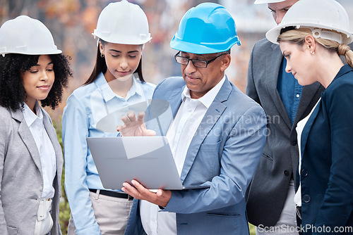 Image of Teamwork, engineer and leader of people with laptop outdoor in city. Computer, planning and group collaboration of architects talking, communicaton and strategy of manager for construction project.