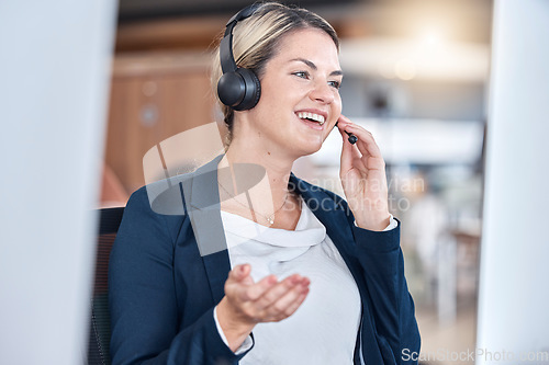 Image of Call center, smile and woman in office for communication, support and contact us for customer service. Listening, telemarketing and sales agent, consultant and happy employee talking in conversation