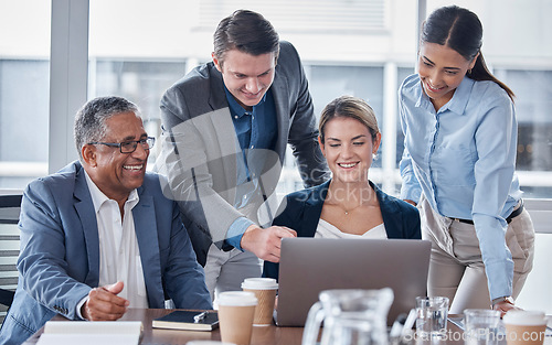 Image of Teamwork, coaching and laptop with business people in meeting for strategy, planning and collaboration. Project management, website and idea with employees in office for brainstorming and development