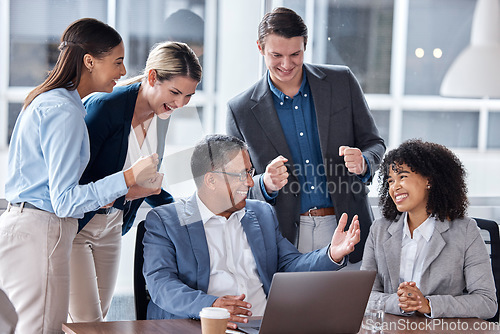 Image of Teamwork, success and laptop with business people in meeting for strategy, planning or collaboration. Project management, winner or idea with employees and ceo in office for brainstorming development