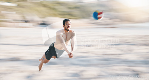 Image of Sports, beach and man diving for volleyball, fun competition and contest with motion blur. Strong male person jump in air to hit ball at sea for fitness, outdoor summer games or action of performance