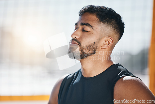 Image of Thinking, fitness and man at volleyball on beach ready for exercise, training and workout for game. Sports, nature and face of Indian male person breathe outdoors for practice, match and competition