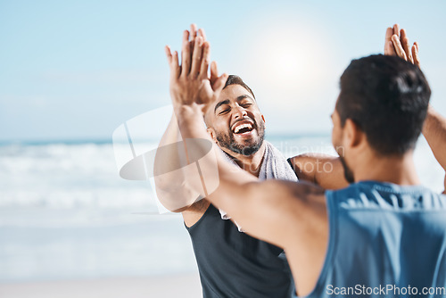 Image of High five, fitness success and people at beach in celebration, winning and workout goals or target. Training, exercise and sports men, personal trainer or athlete friends, hands together and support