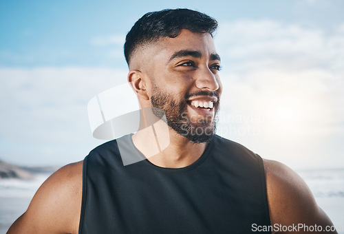 Image of Thinking, fitness and face of man on beach ready for exercise, marathon training and cardio workout. Sports, nature and happy Indian male person outdoors for wellness, warm up and running by ocean