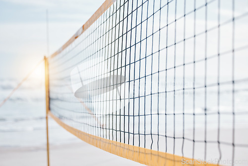 Image of Background, volleyball and closeup of net at beach for fun competition, contest and flare in sunshine. Sports posts, barrier and rope design at sea for outdoor summer games, match or team performance