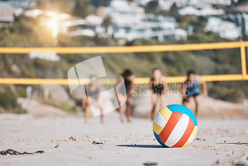 Image of Ball, beach and volleyball sports with people together for fitness challenge or competition. Young men and women or athletes ready for exercise, workout or fun game outdoor in nature, sea or sand