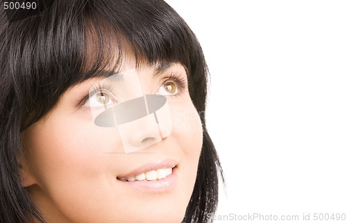 Image of happy woman looking up