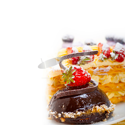 Image of selection of fresh cream cake dessert plate