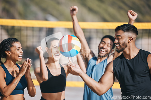 Image of People, volleyball and team celebration on beach for winning, victory or sports achievement in nature. Happy group of athletes or friends with ball for volley championship or success on ocean coast