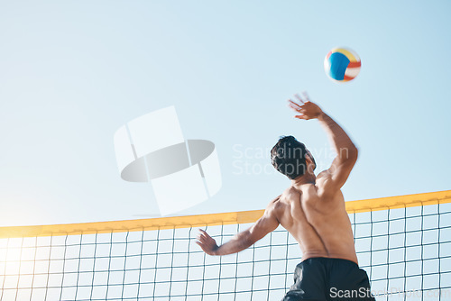 Image of Volleyball, man and spiking, net with sports and fitness outdoor, playing game with blue sky and summer. Exercise, male athlete and match with ball and active, workout and action with tournament