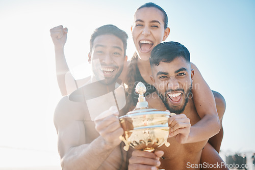 Image of Winning, portrait and volleyball team on the beach with a trophy for goals, success or achievement. Happy, celebrate and group of athletes in unity together by ocean or sea on a summer weekend trip.