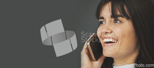 Image of Happy woman, face and phone call on mockup space for communication, networking or social media. Female person smile talking on mobile smartphone in banner advertising against a grey studio background