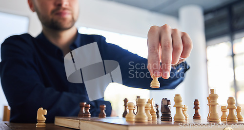 Image of Chess, man moving a pawn and game of strategy, problem solving or person playing on chessboard in competition. Planning, choice and hand on knight or king, queen and player thinking of winning move