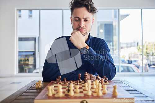 Image of Chess, man and thinking of strategy in game, problem solving or person playing on chessboard in competition. Planning, choice and focus on challenge or king, queen and player with decision to move