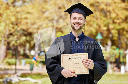 Image of Graduate, guy and certificate with portrait in outdoor with success for education or scholarship. Achievement, male student and diploma with motivation or degree in information technology at college.