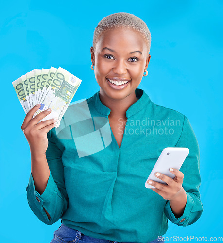 Image of Cash, phone and woman in portrait for winning, finance or online savings, profit or cash prize. Success, lottery and winner or african person on mobile, money fan or banking on studio blue background