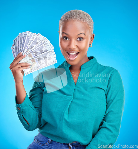 Image of Woman, wow portrait and money fan for bonus, financial success and winning, finance loan or cashback bonus. African person or winner surprise for notes or cash profit on a studio, blue background