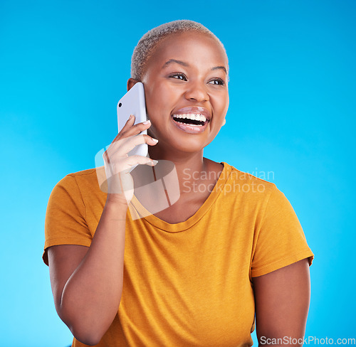 Image of Phone call, studio smile and black woman laugh at funny communication, consulting joke or conversation humour. Networking smartphone, comedy and talking African person laughing on blue background