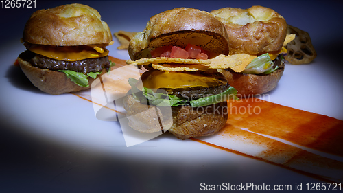 Image of Mexican quesadilla with chicken, cheese and peppers on wooden table