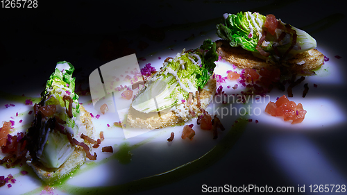 Image of Caesar salad on table. Healthy food style