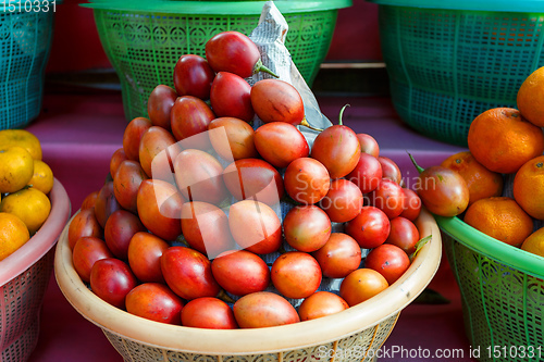 Image of Tamarillo, fruit in plastic basket