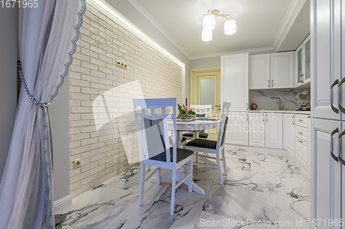 Image of White kitchen in classic style