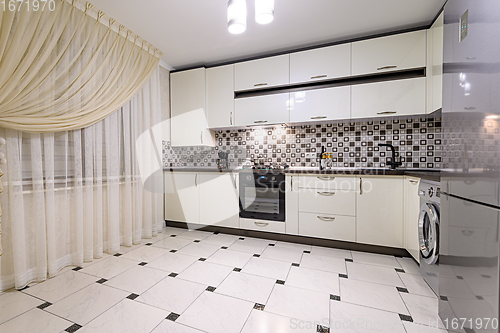 Image of Black and white modern kitchen interior